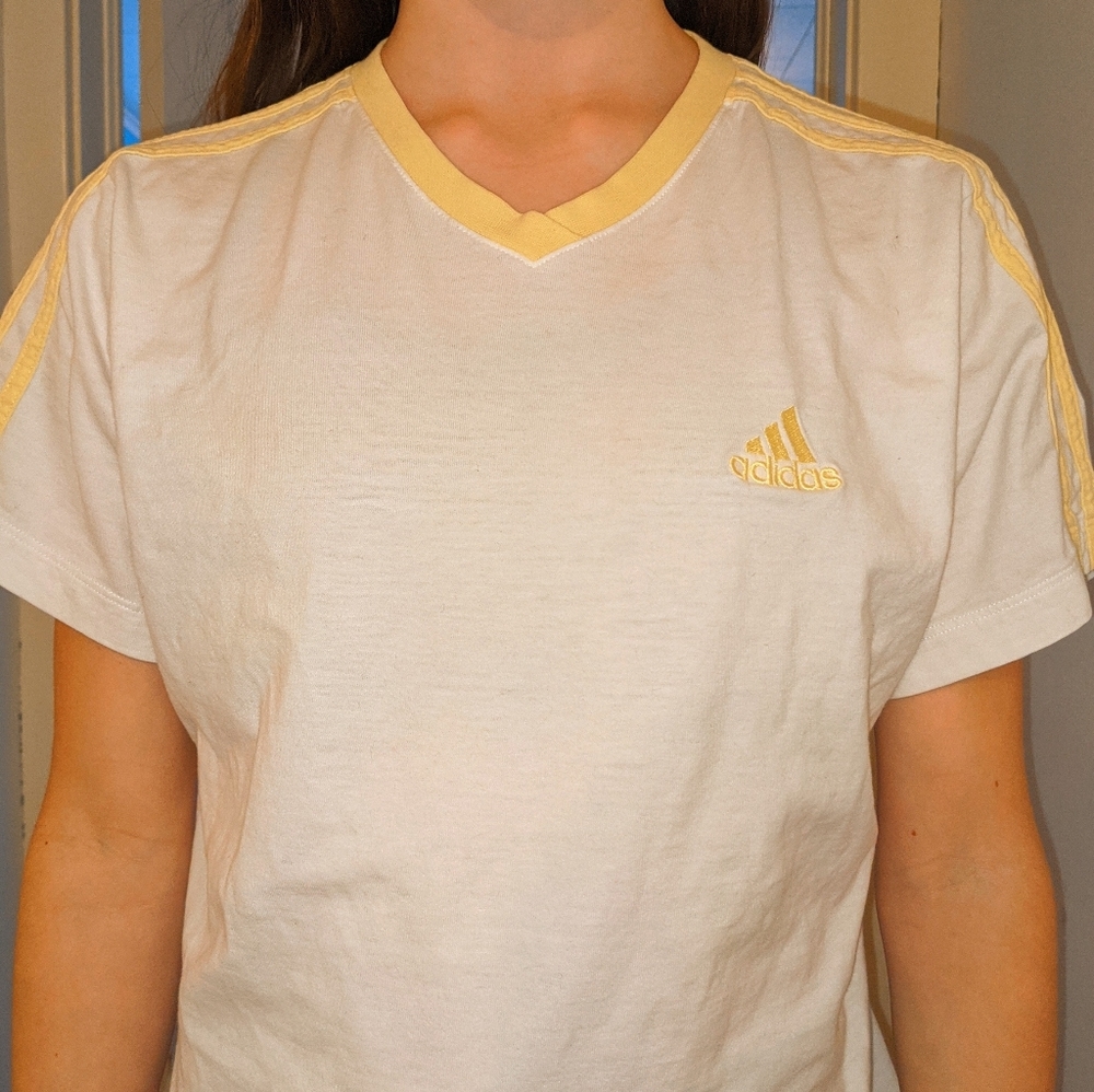 White Adidas T-shirt with yellow stripes